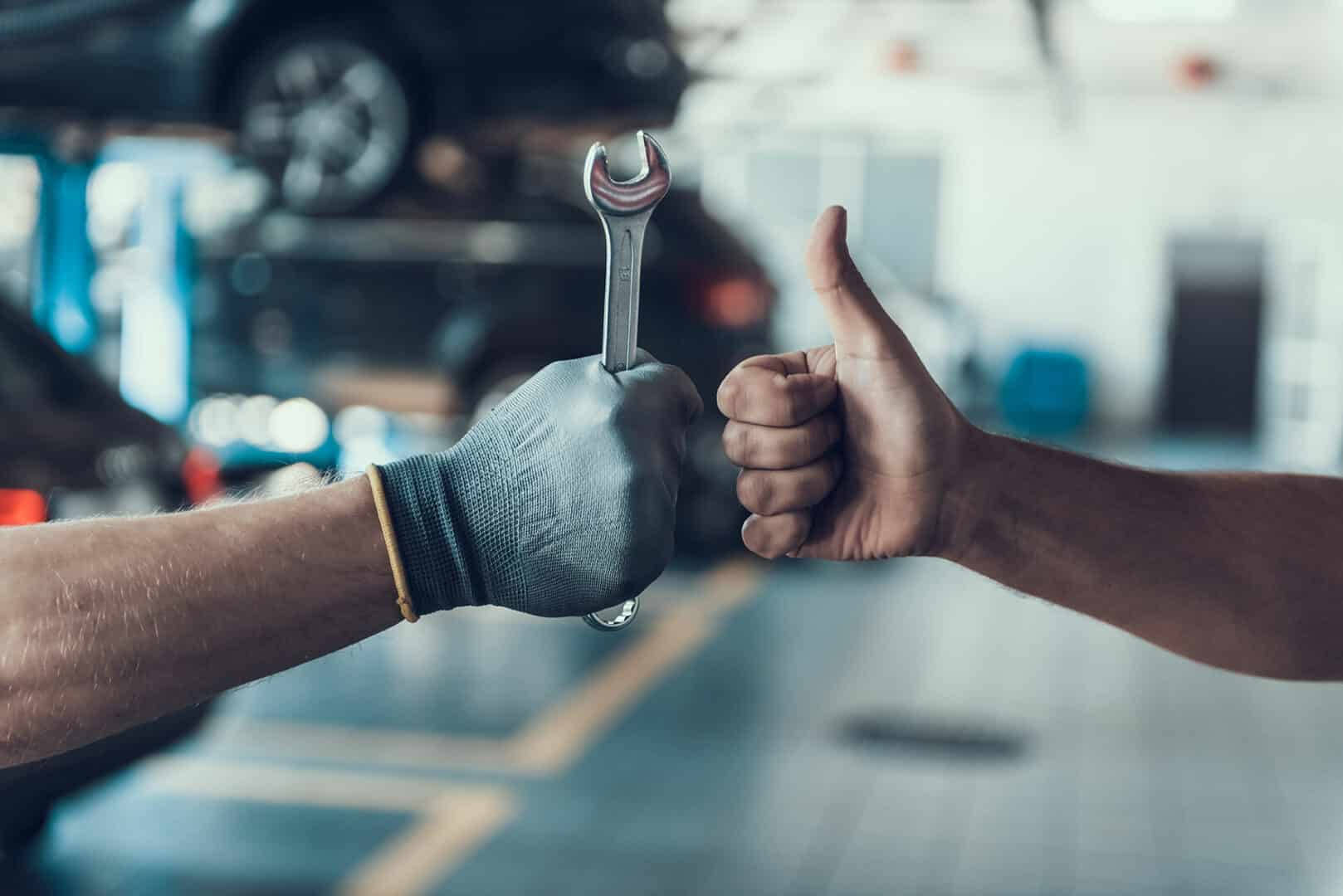 Car Mechanics Maintenance Thumbs Up Wallpaper