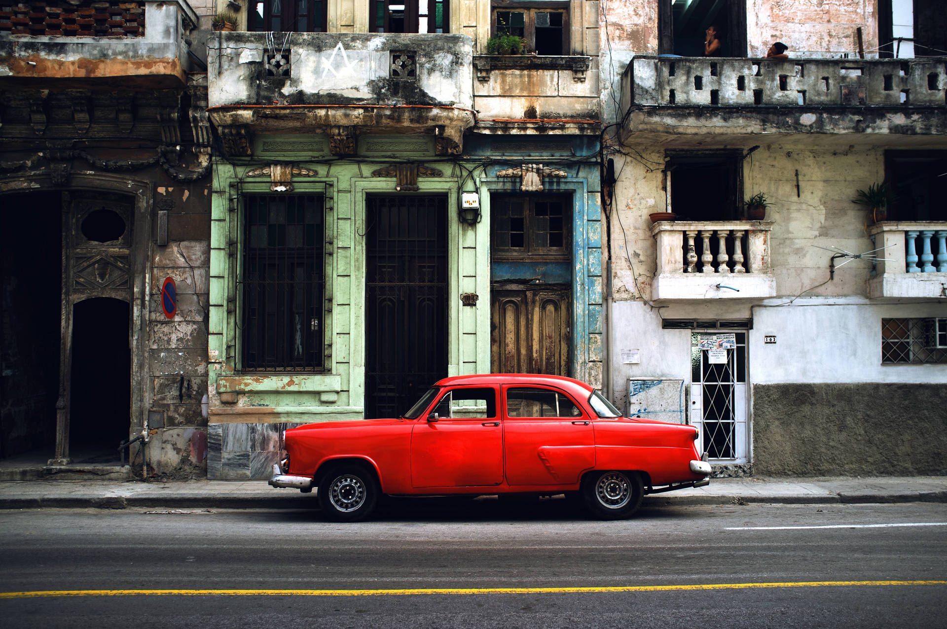 Car Parked On The Road In Cuba Wallpaper