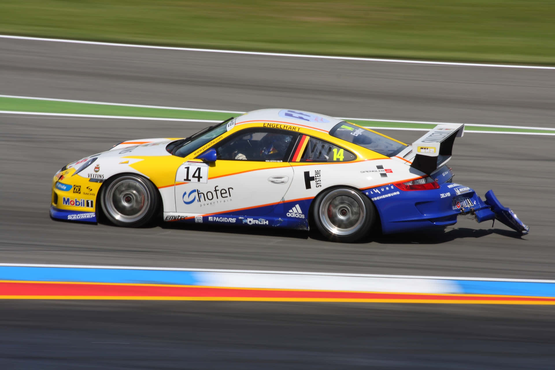 Intense car racing battle on a high-speed track Wallpaper