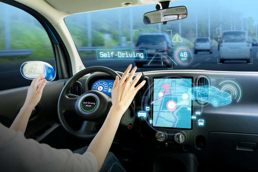 Futuristic car dashboard in an autonomous driving car Wallpaper