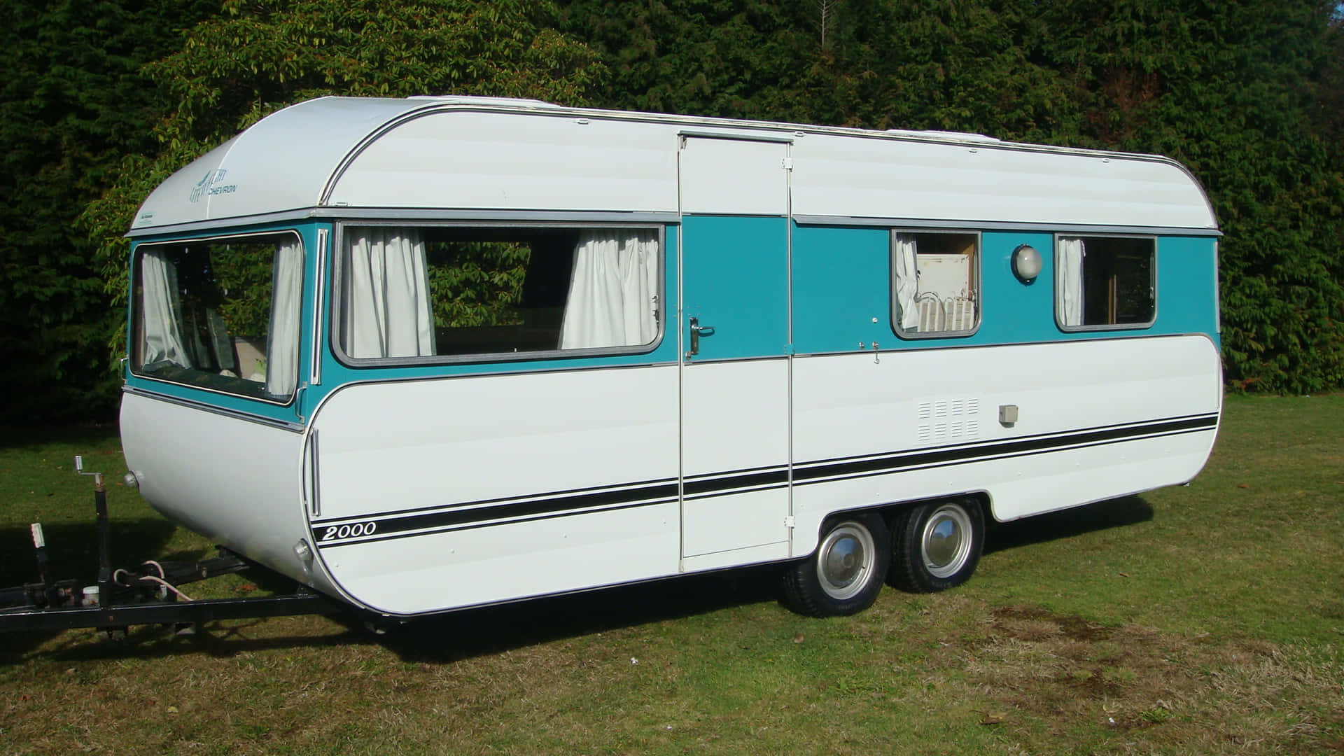 A Small Trailer With A Blue And White Interior