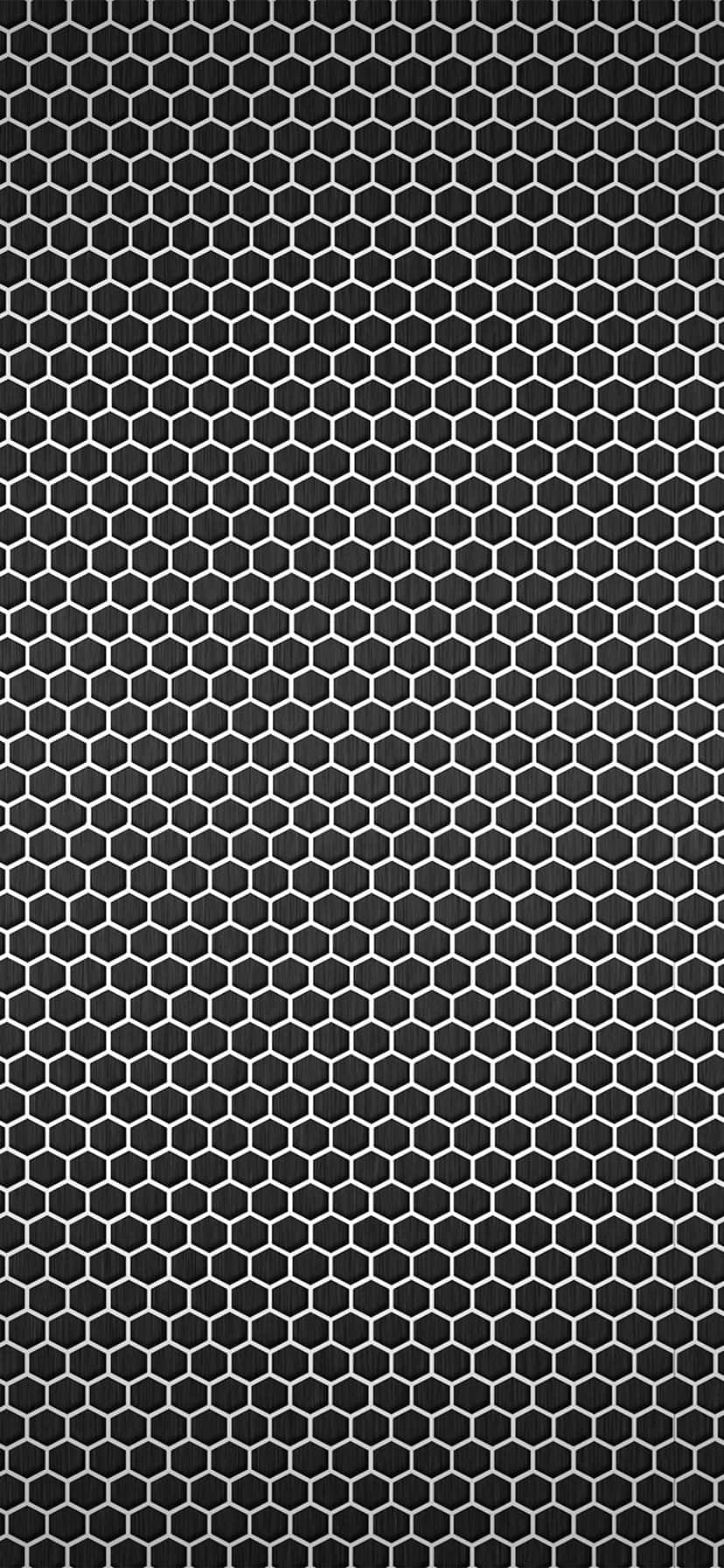 A Black And White Hexagonal Pattern On A Black Background Wallpaper