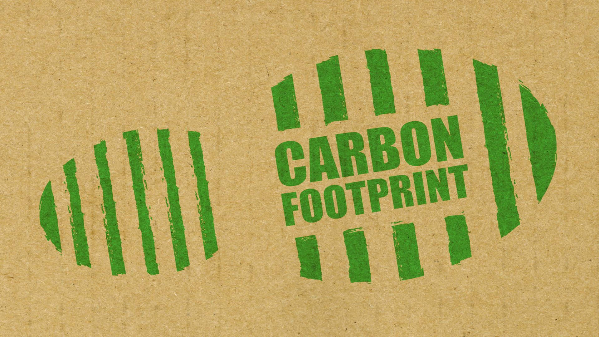 Caption: Carbon Footprint Concept with Green Footprint on Earth Wallpaper