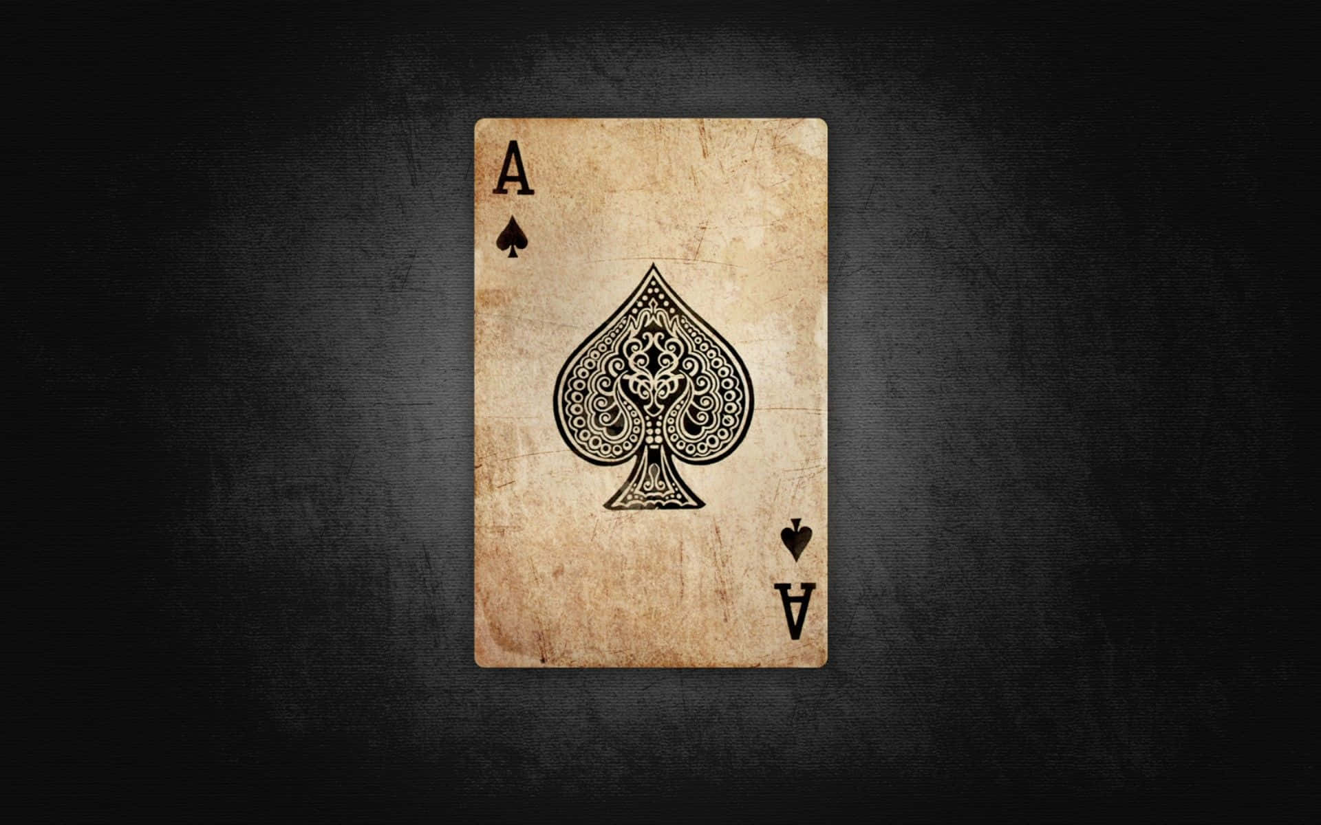 A hand of cards on a sleek, black background Wallpaper