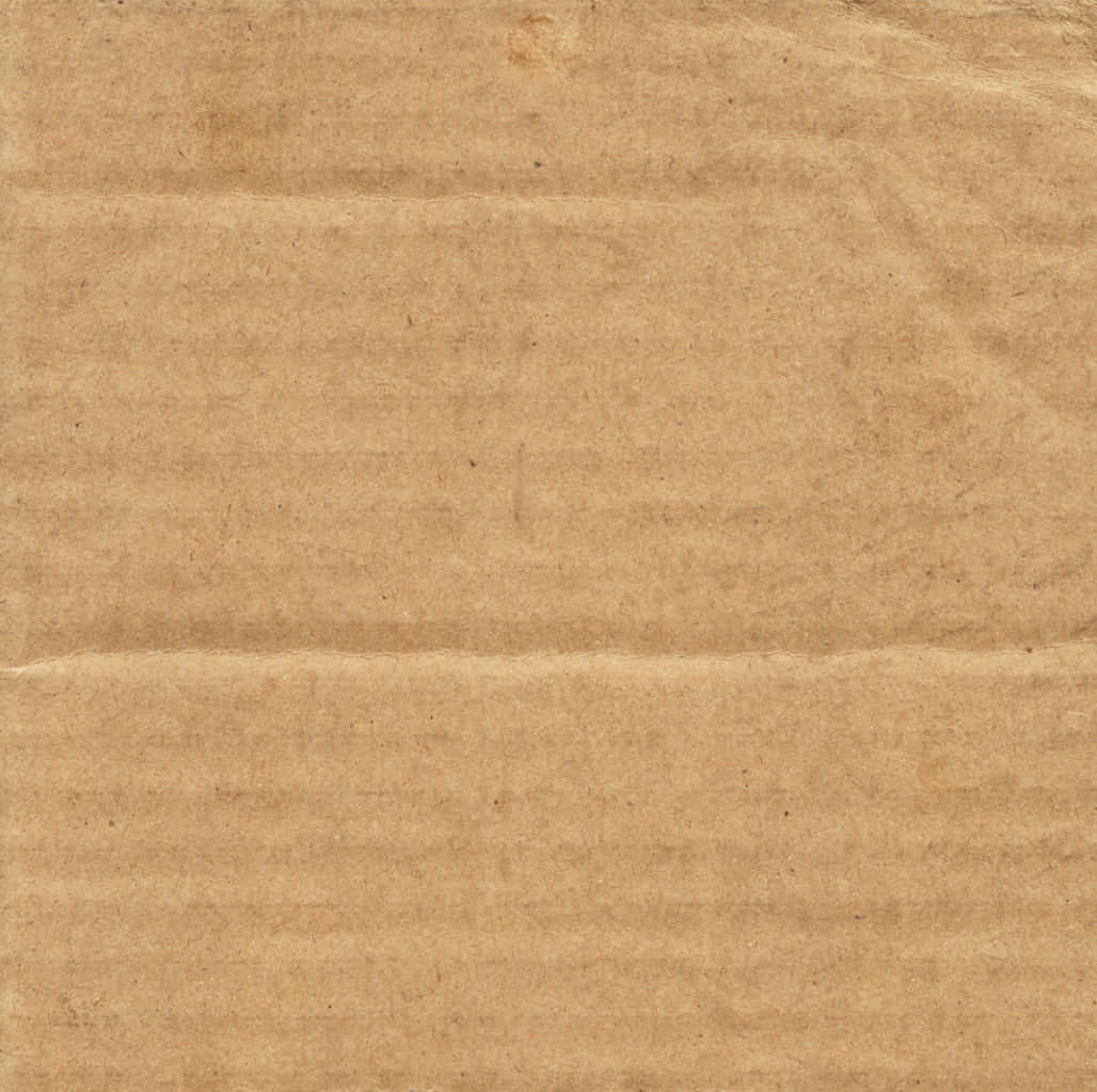A Brown Cardboard Paper With A Brown Background