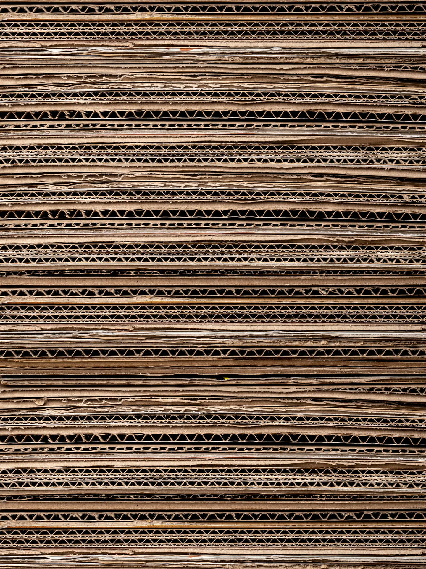 A closer look at a stacked corrugated cardboard background
