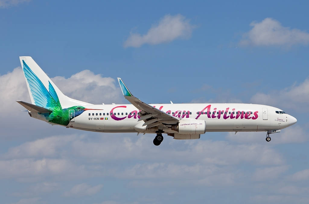 Caribbean Airlines Flying Passenger Airplane Wallpaper