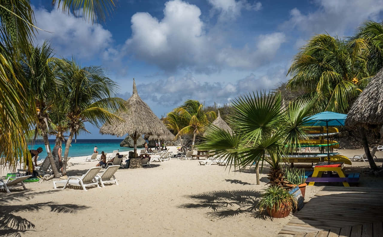 A Tranquil Paradise: Caribbean Island Beach Wallpaper