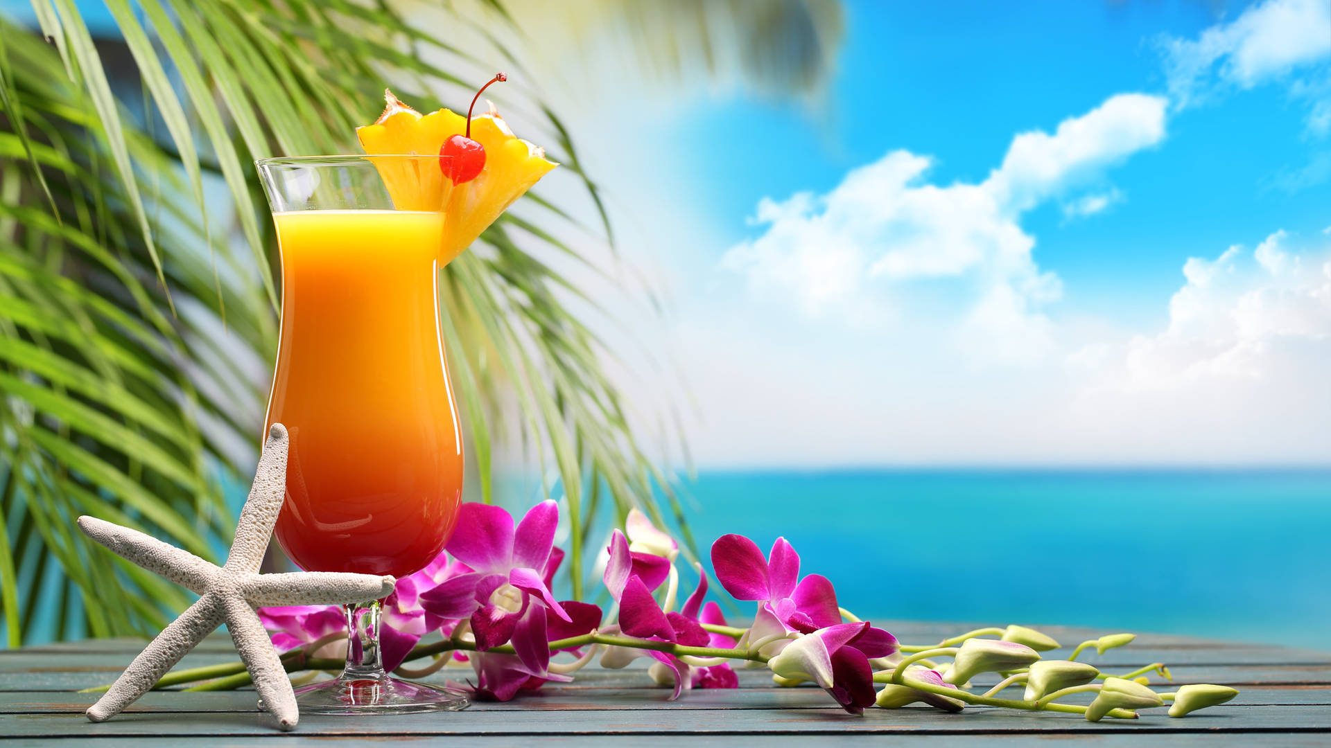 Karibischersonnenaufgang Tropischer Drink Wallpaper