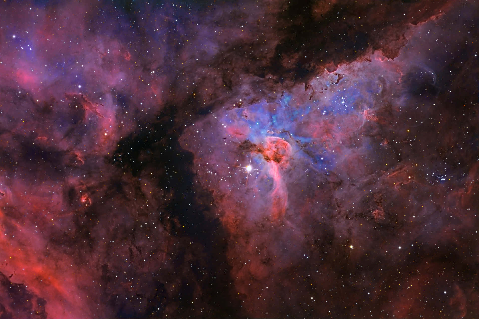 Mystical Carina Nebula: A cosmic wonder in the night sky Wallpaper