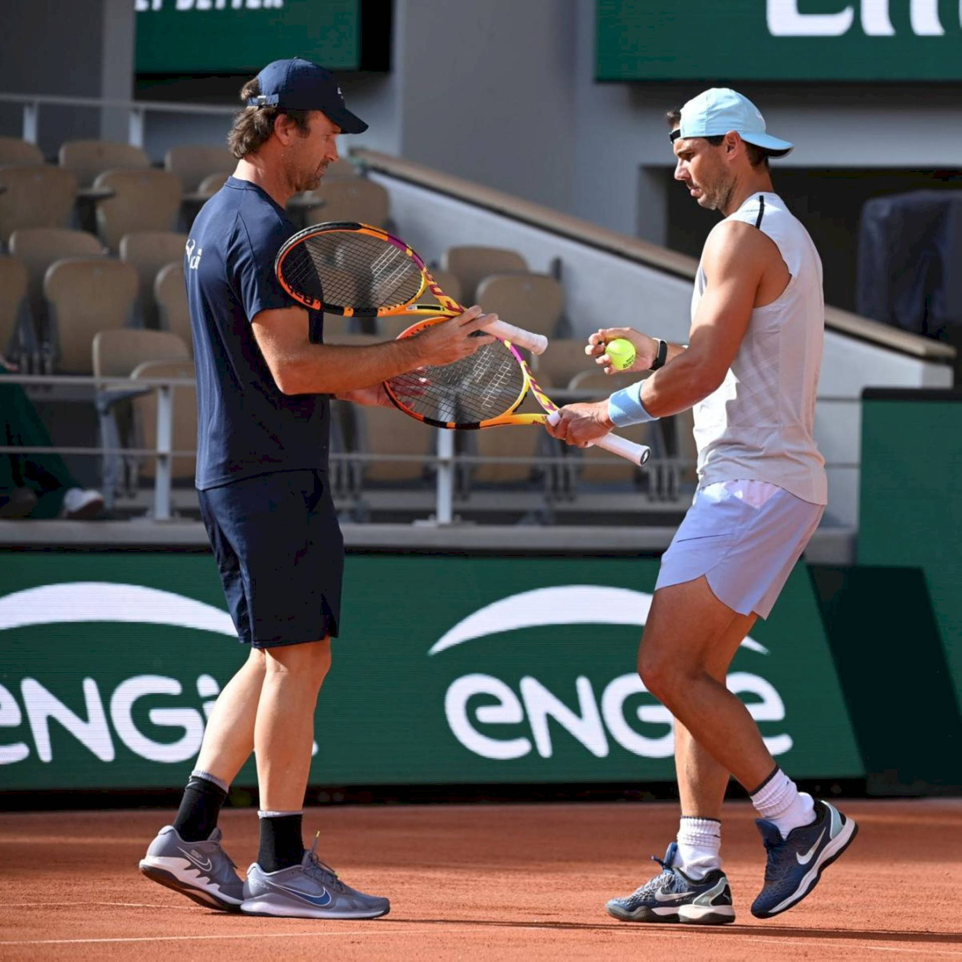 Carlos Moya Nadal Exchanging Rackets Wallpaper