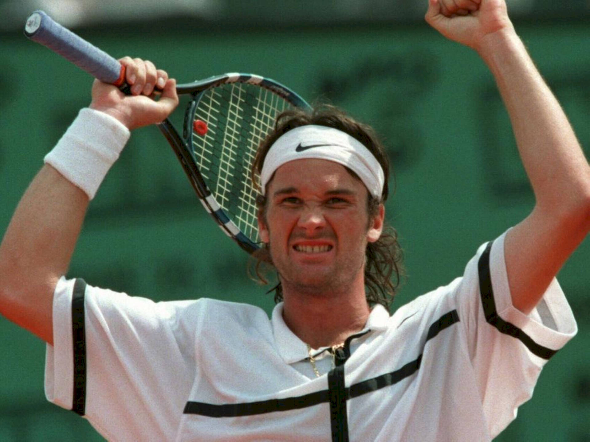 Tennis Icon Carlos Moya In A Candid Moment Wallpaper