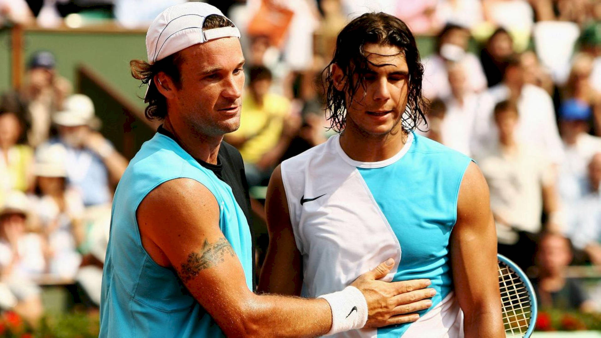 Carlos Moya Touching Young Nadal Chest Wallpaper