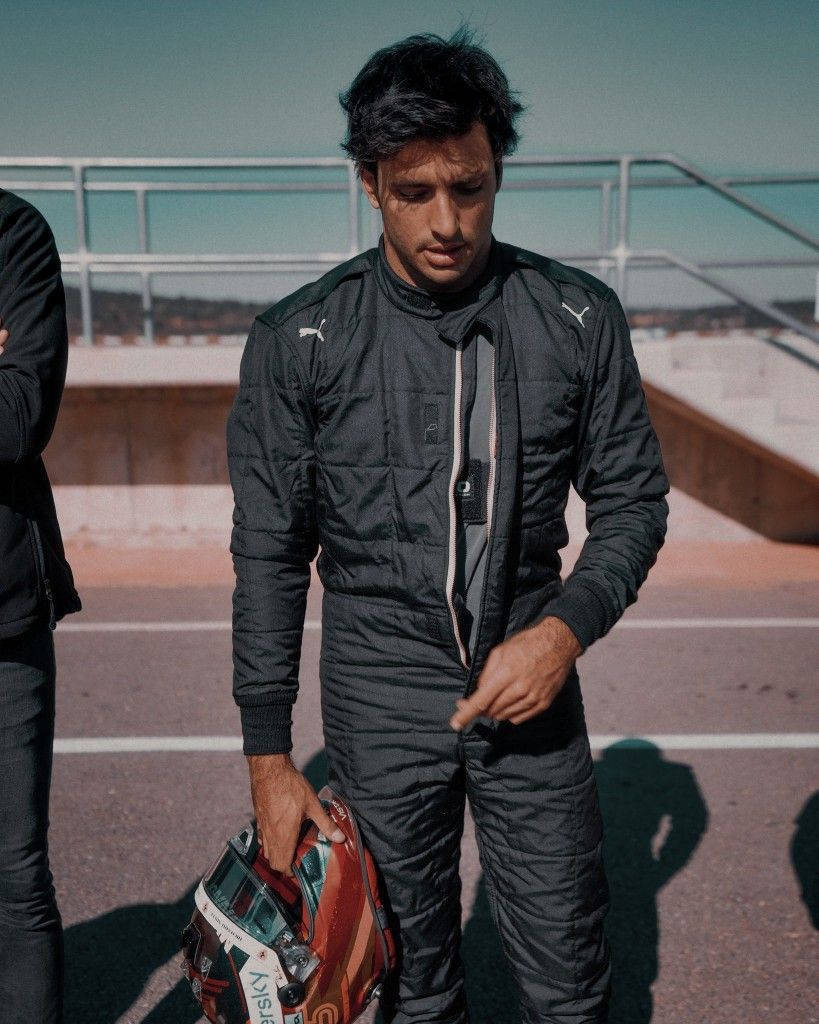 Carlos Sainz Jr Black Racing Suit Wallpaper