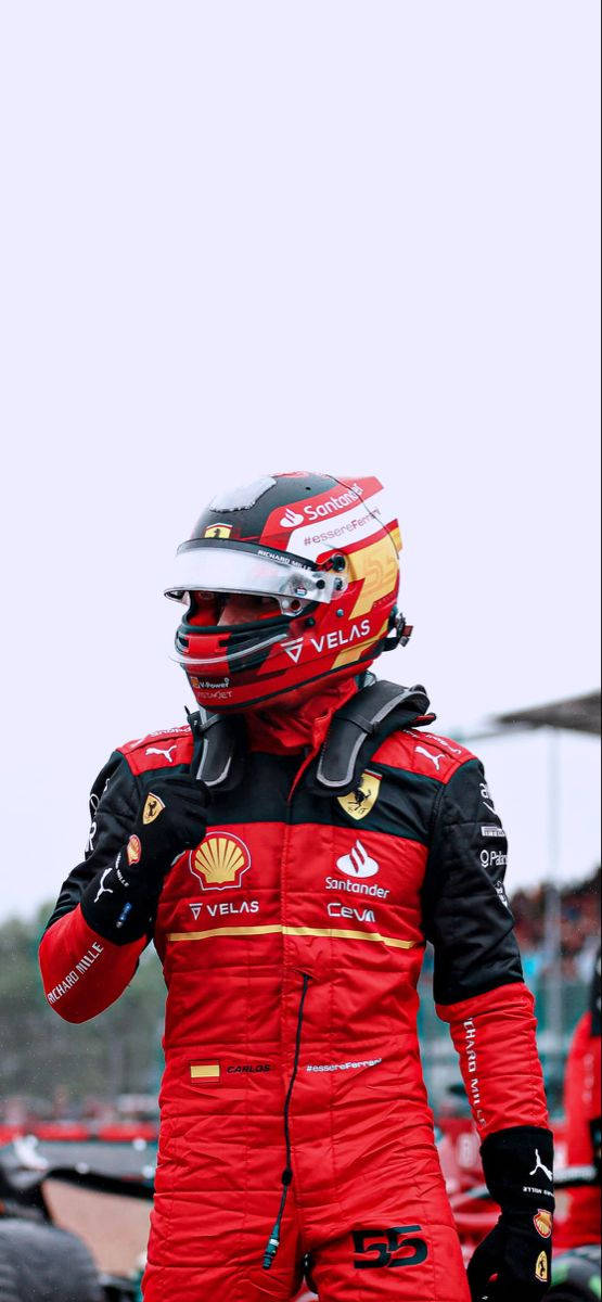 Carlos Sainz Jr Full Racing Suit Wallpaper