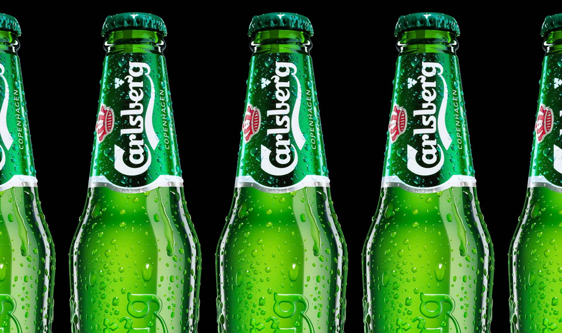 Botellasde Bebida Alcohólica Carlsberg Beer Fondo de pantalla