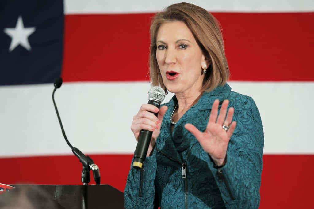 Carly Fiorina In Teal Outfit Wallpaper