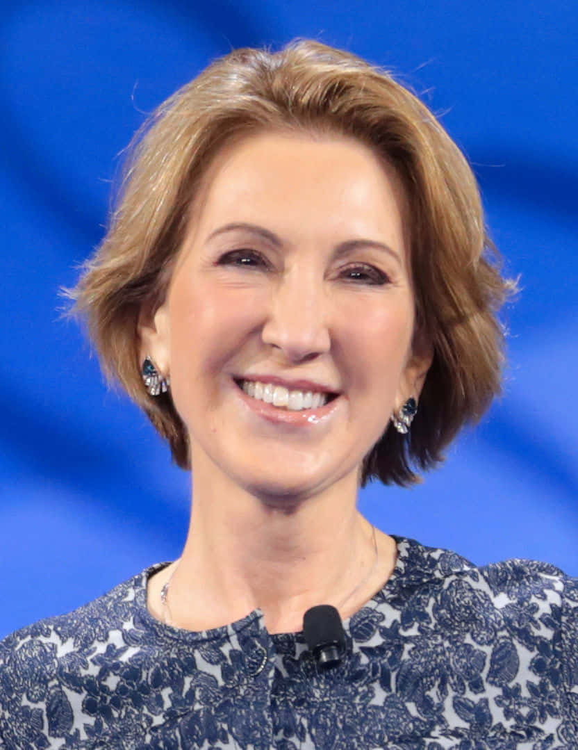 Carly Fiorina Smiling With Black Earrings Wallpaper