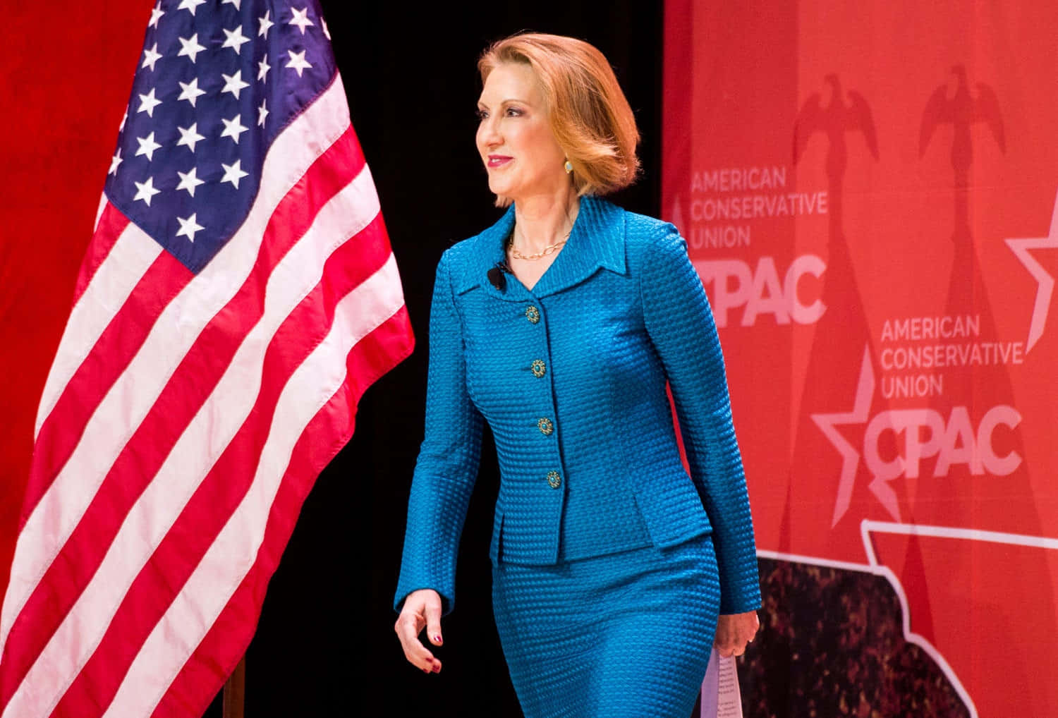 Carly Fiorina Walking Onto Cpac Stage Background
