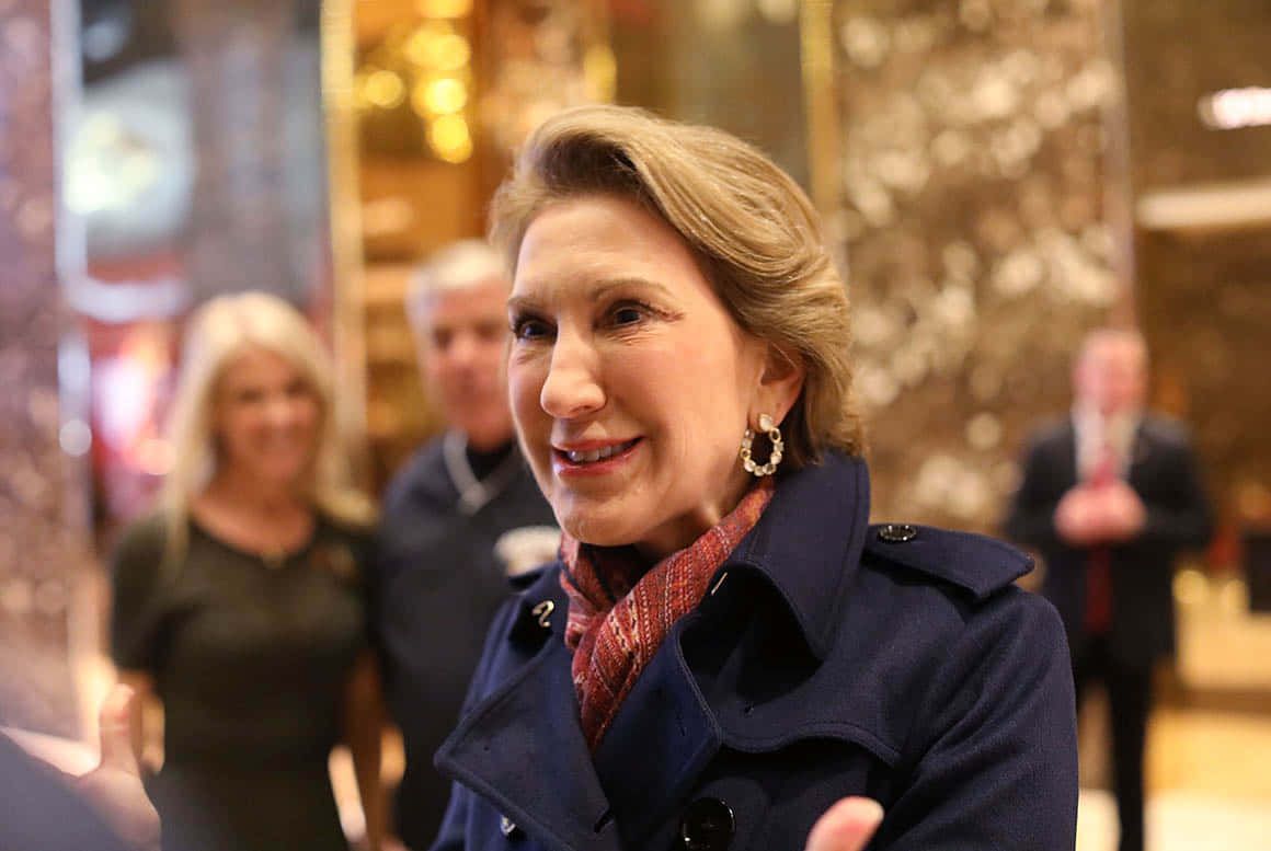 Carly Fiorina With Scarf And Coat Background
