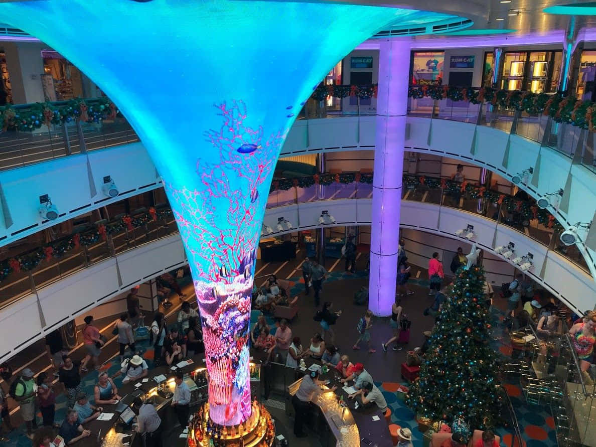 A Large Christmas Tree In The Middle Of A Ship