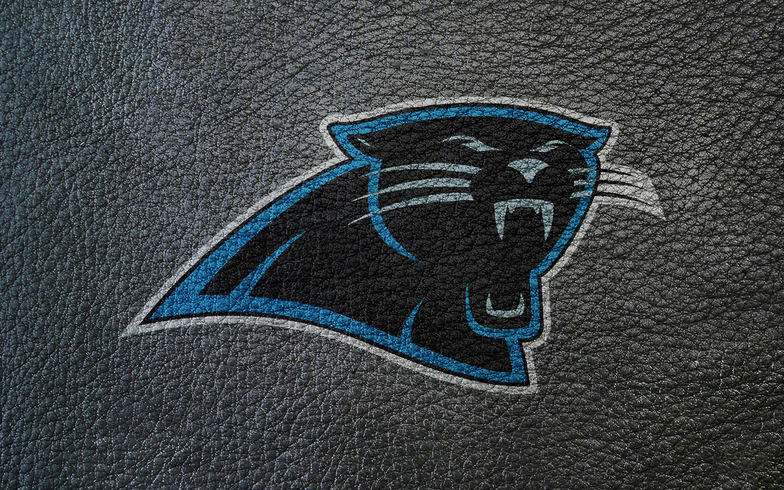 Carolina Panthers Logo On Leather Texture Wallpaper