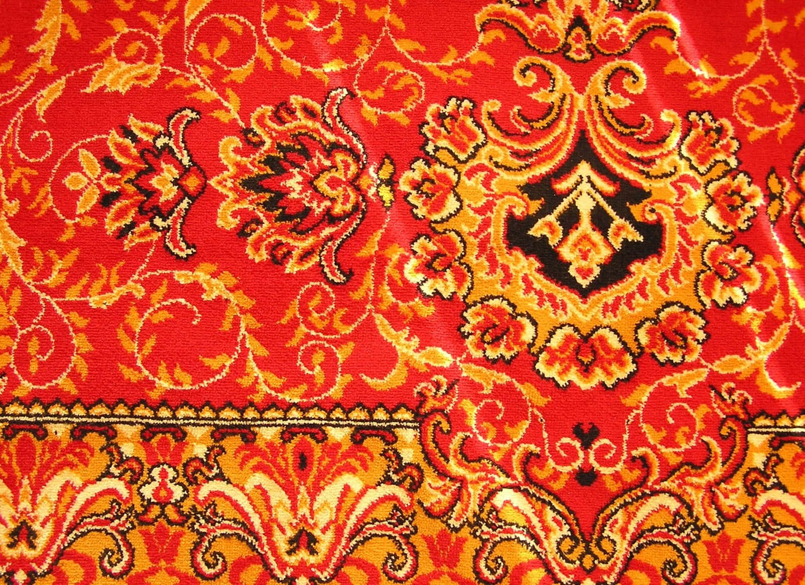 A close-up of a patterned carpet – a real-world view of carpet texture.