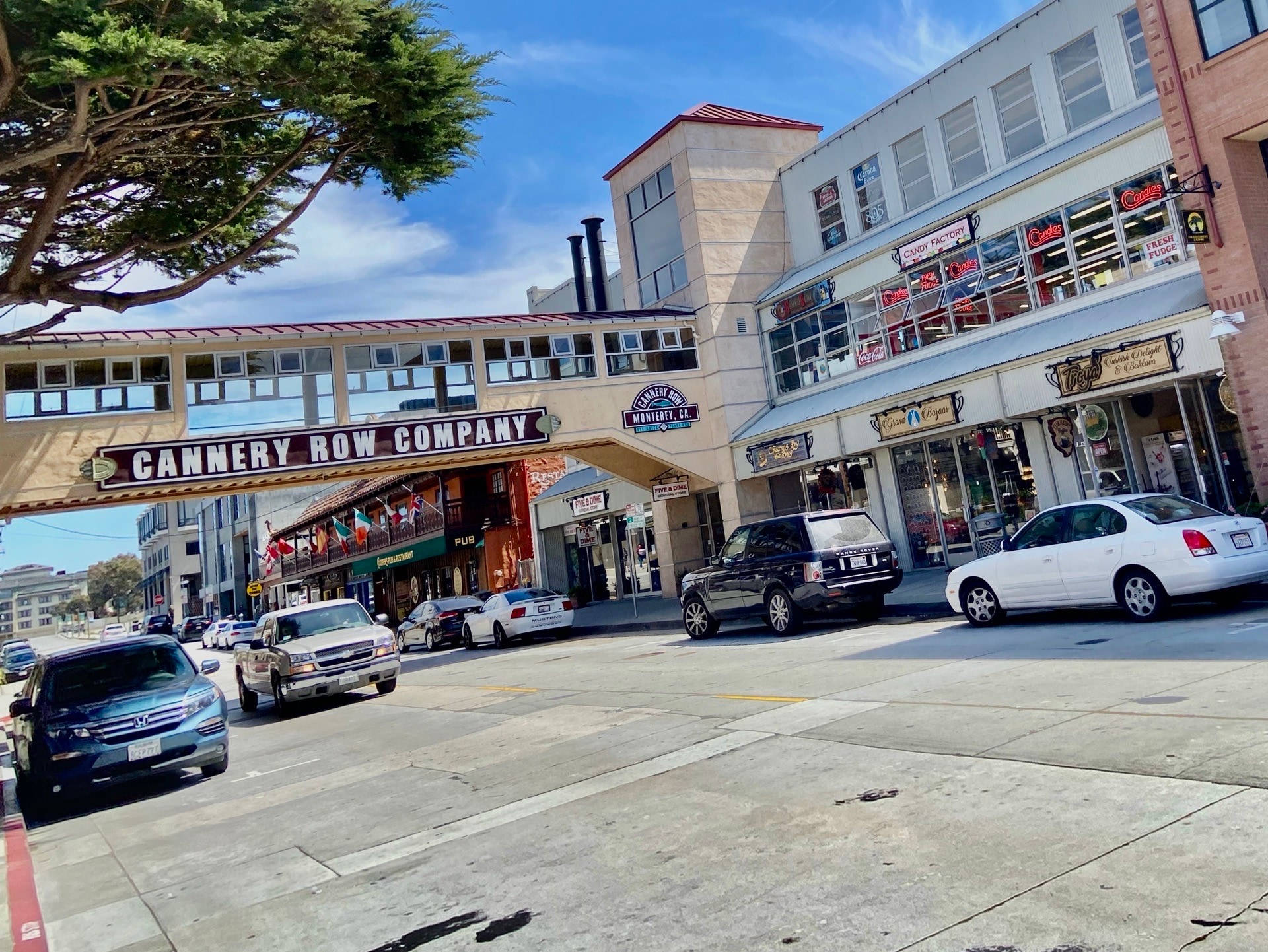 Cars Passing Through Cannery Row Wallpaper