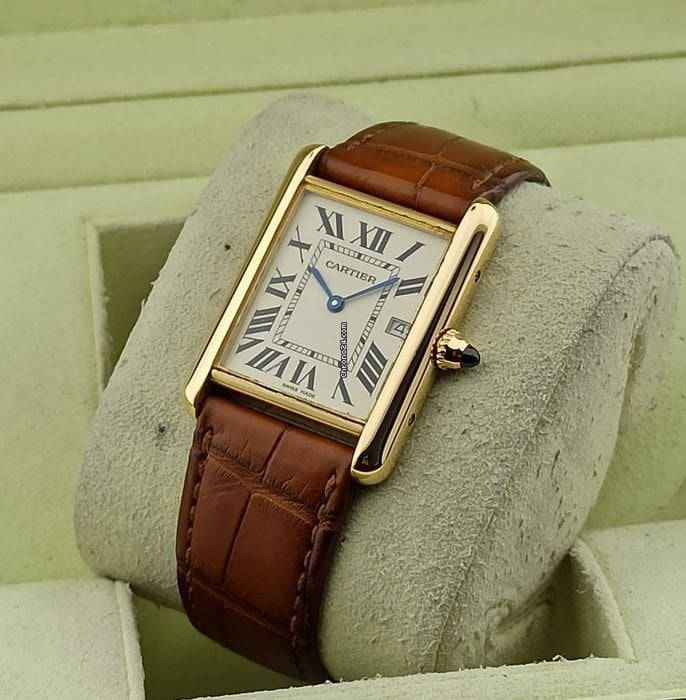 Download Cartier Leather Gold Watch Wallpaper | Wallpapers.com