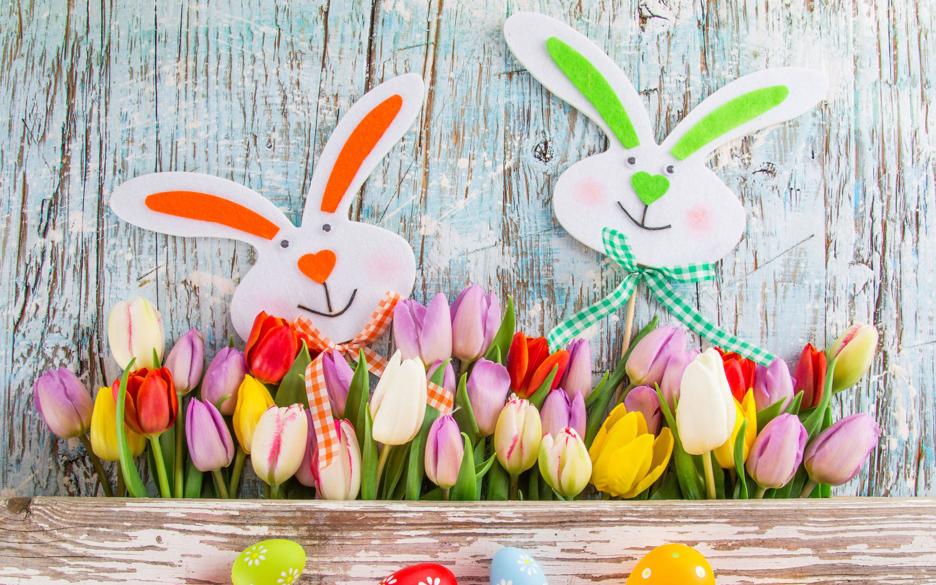 Cartoon Bunnies Happy Easter With Tulips Wallpaper
