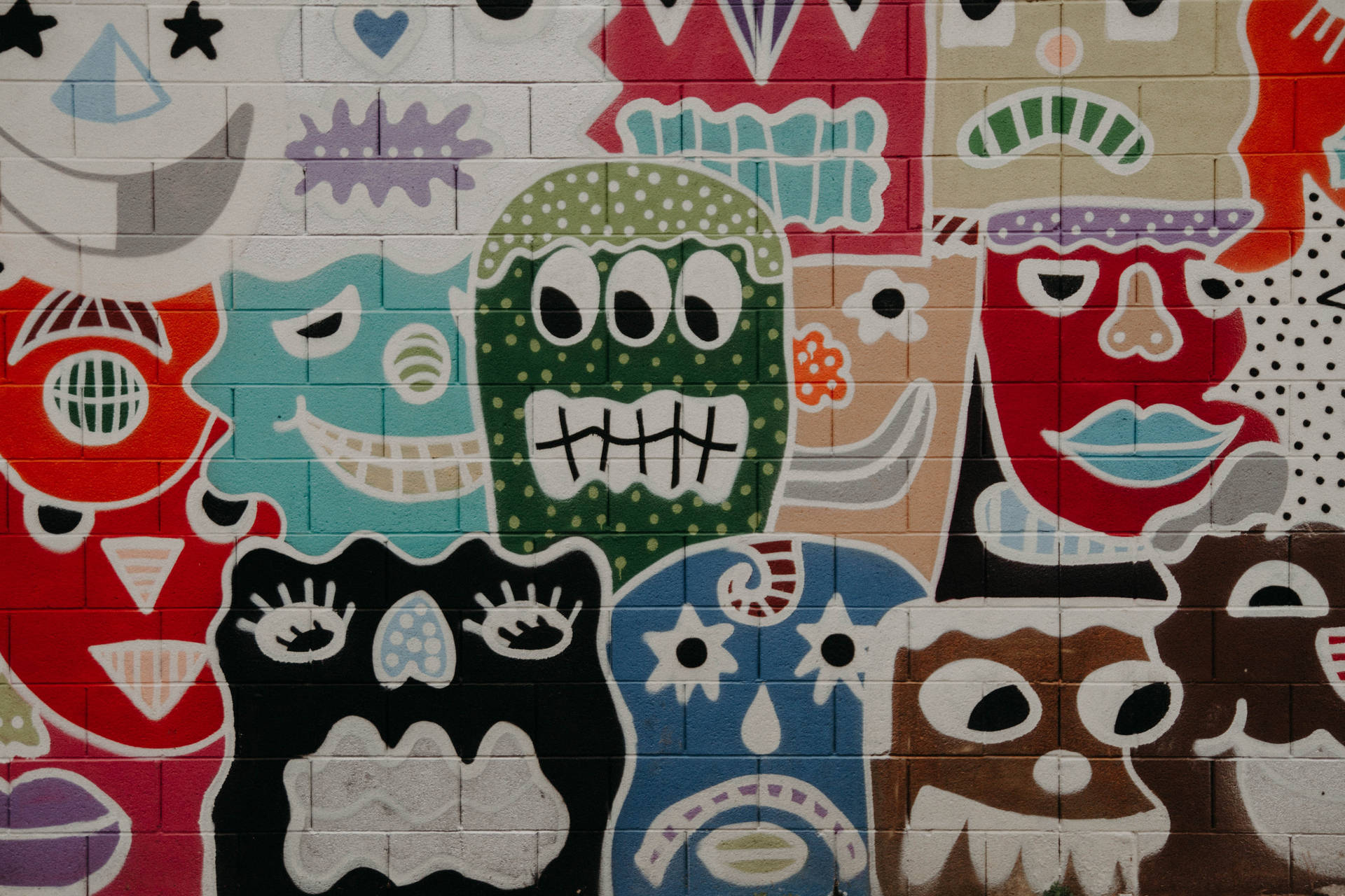Graffiti Art with abstract faces showing uniqueness.