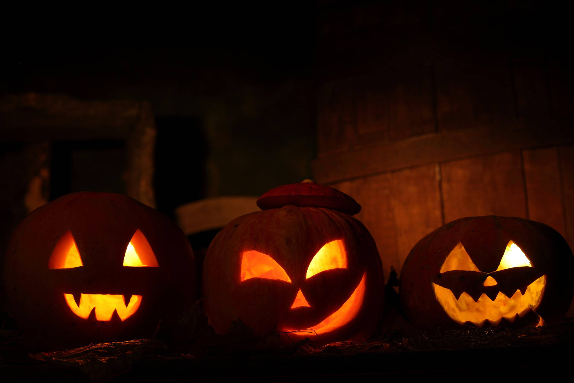 'Just in time for Halloween, carved pumpkins illuminated by a full moon' Wallpaper