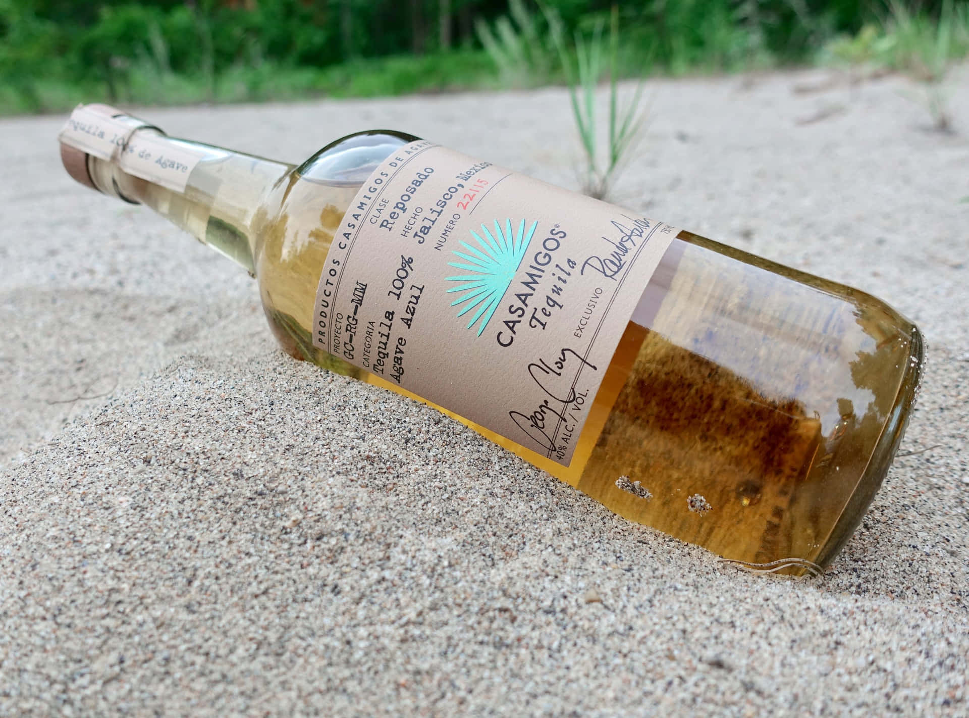 Casamigos Tequila Reposado Liquor Bottle On Sand Picture