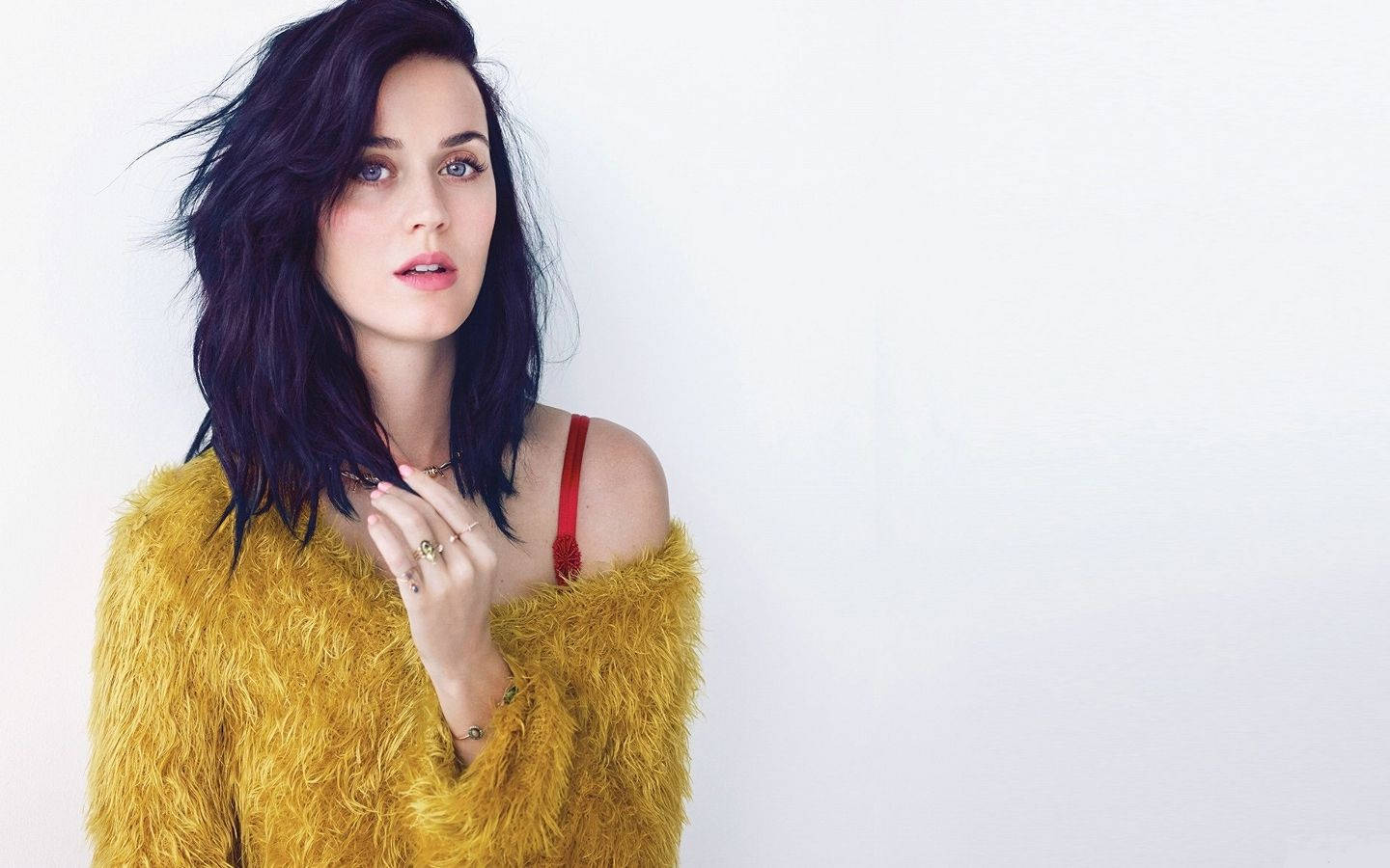 Katy Perry looking stylish in a yellow fur shirt Wallpaper