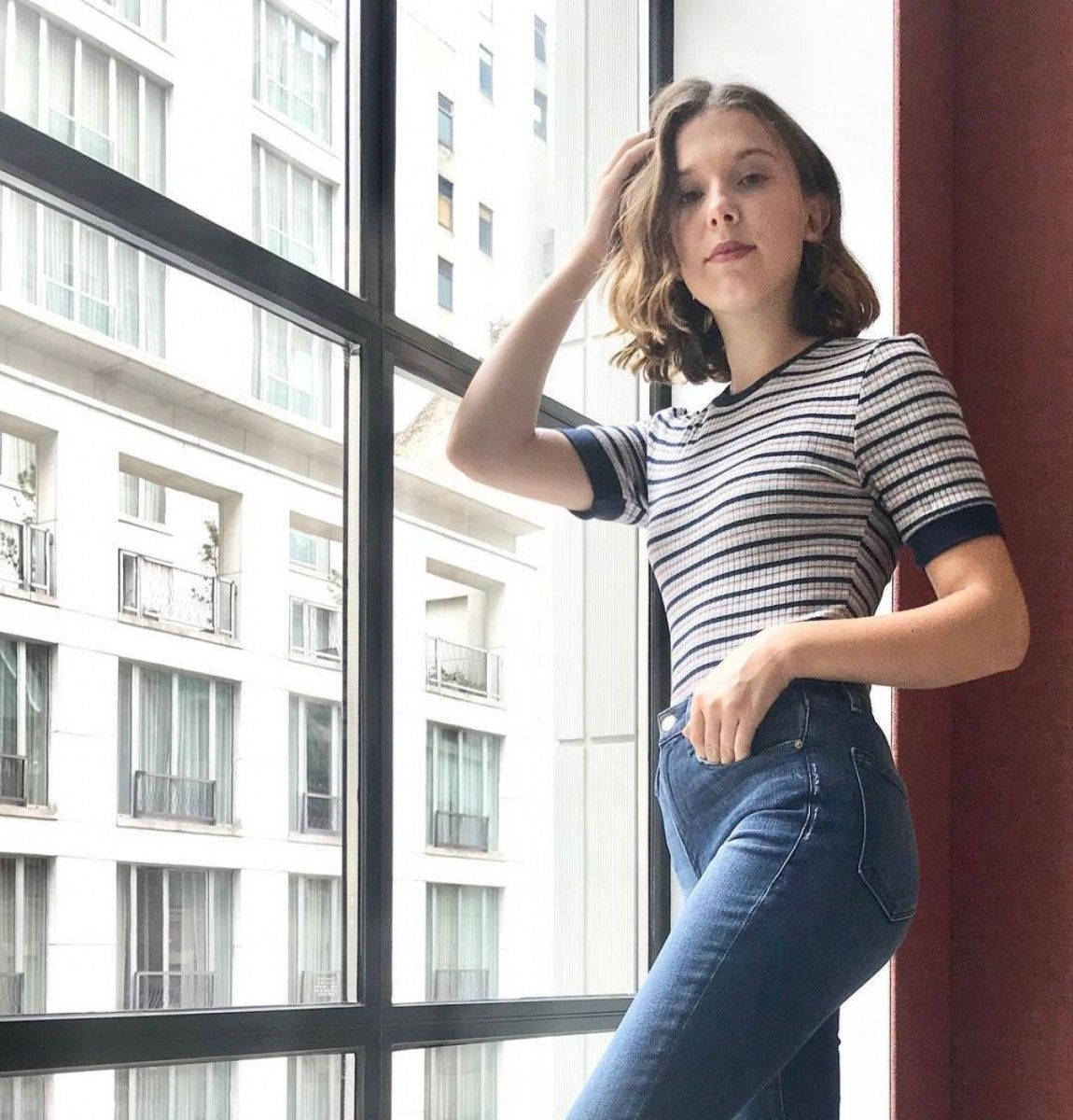 Millie Bobby Brown rocking a cool and casual look. Wallpaper