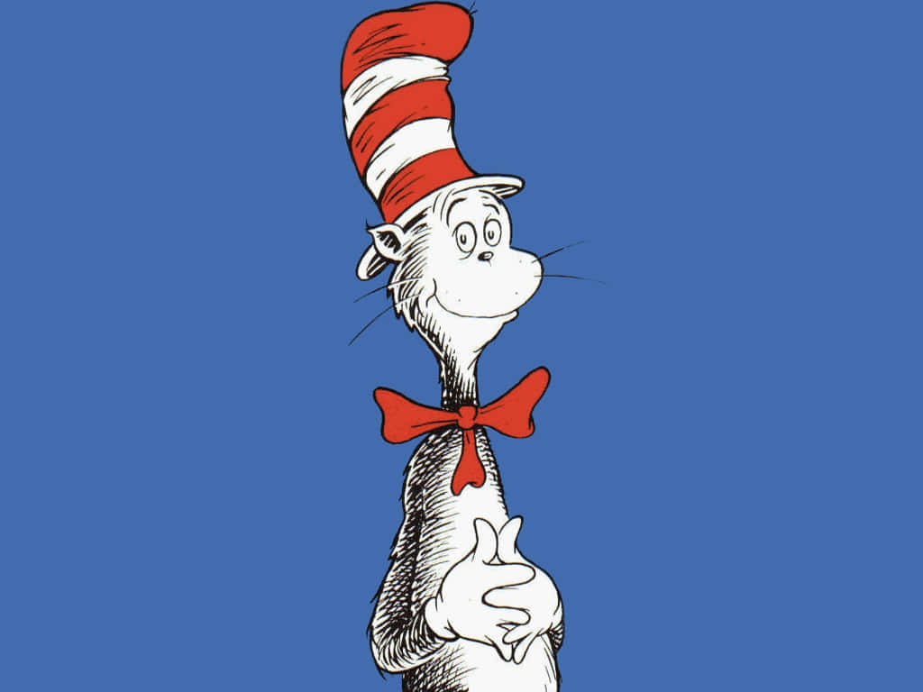 A Cat In The Hat Is Standing Up On A Blue Background