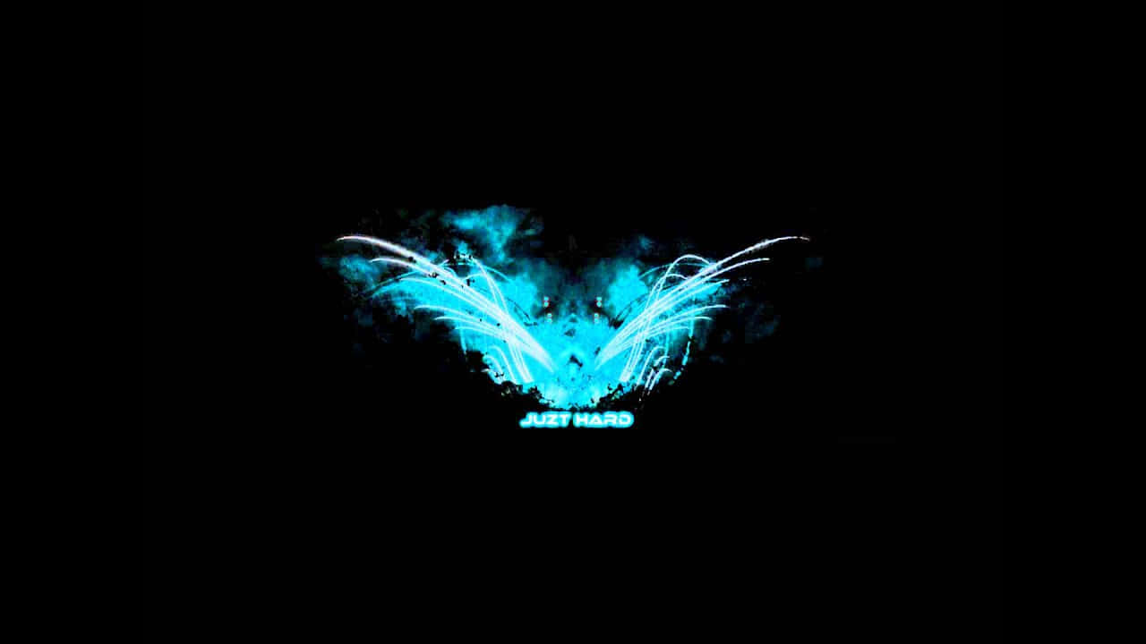 A Blue Flame With Wings On A Black Background Wallpaper