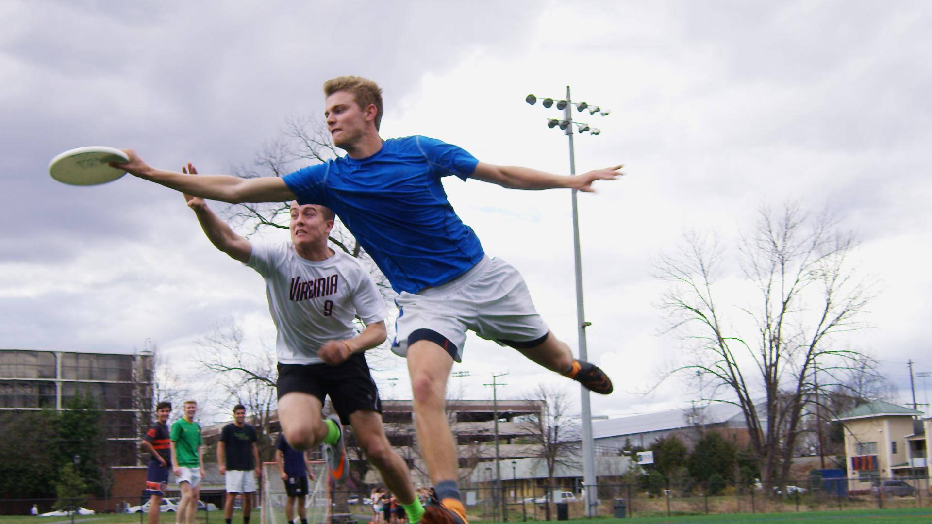 Catching Ultimate Frisbee Disc Wallpaper
