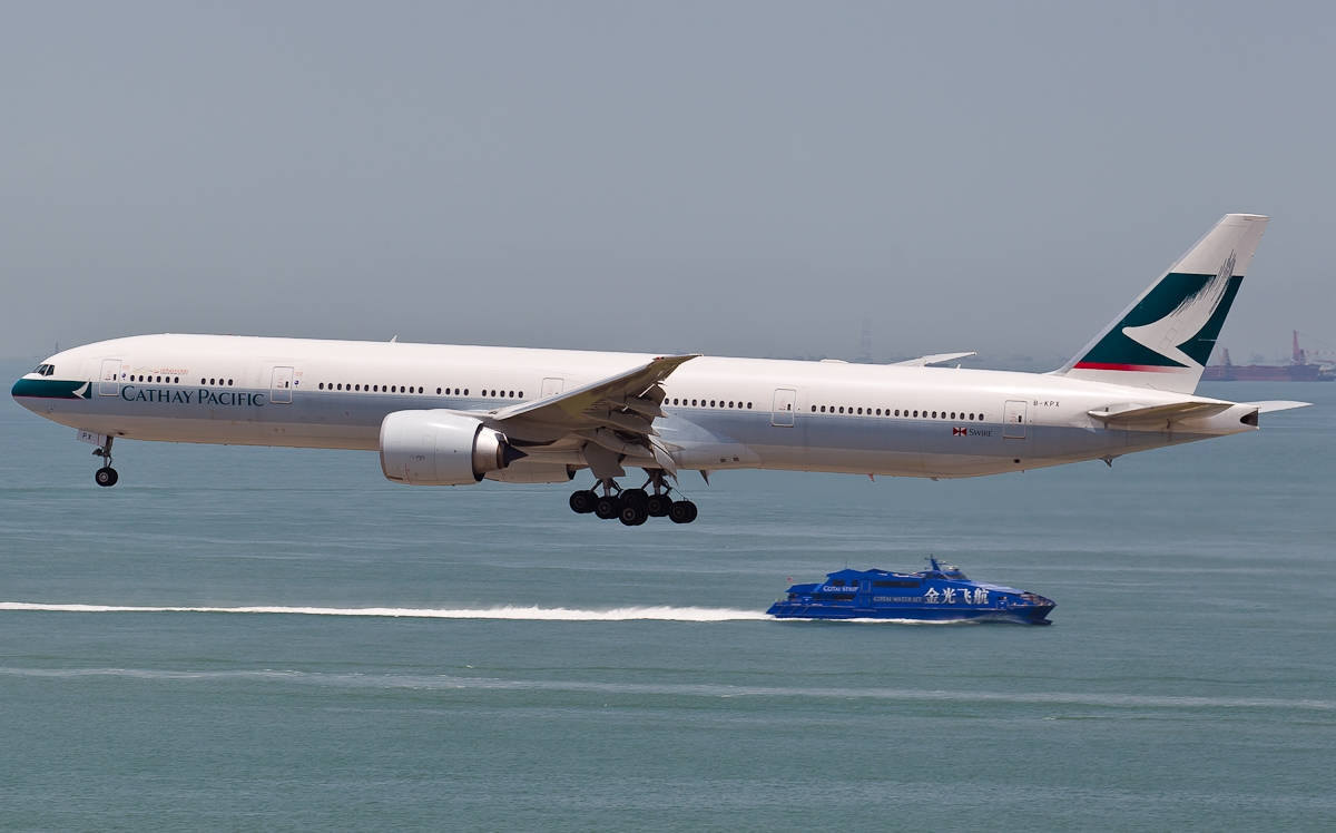 Cathay Pacific Plane And Blue Ship Wallpaper