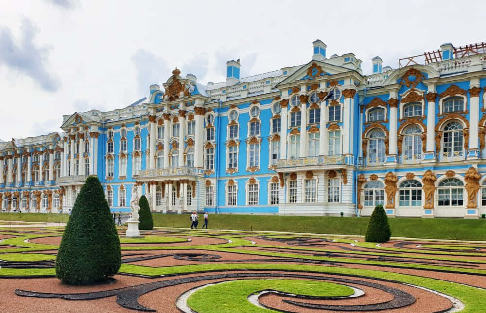 Majestic View of Catherine Palace and its Enchanting Garden Wallpaper