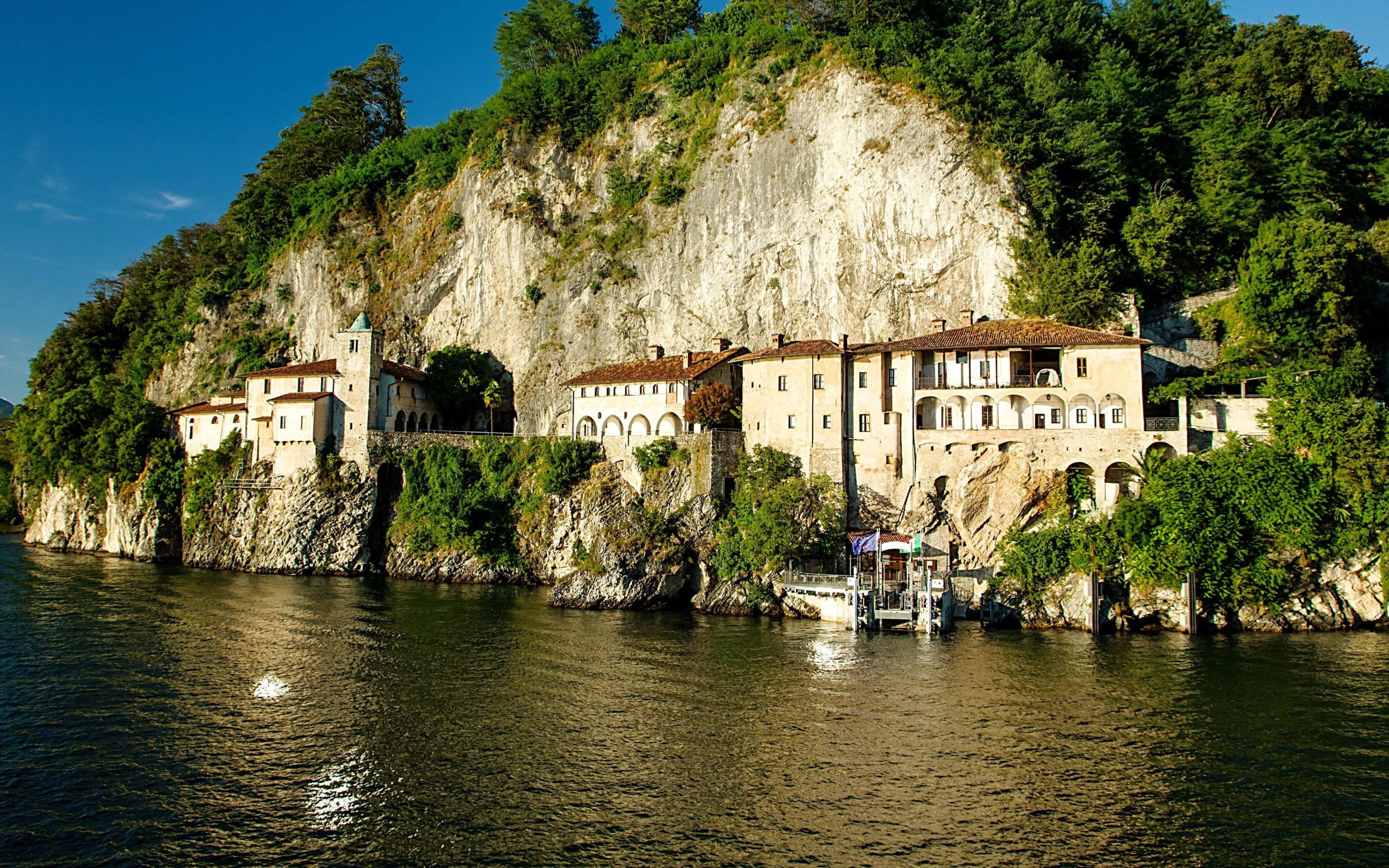 Catholic Monastery On A Cliff Wallpaper