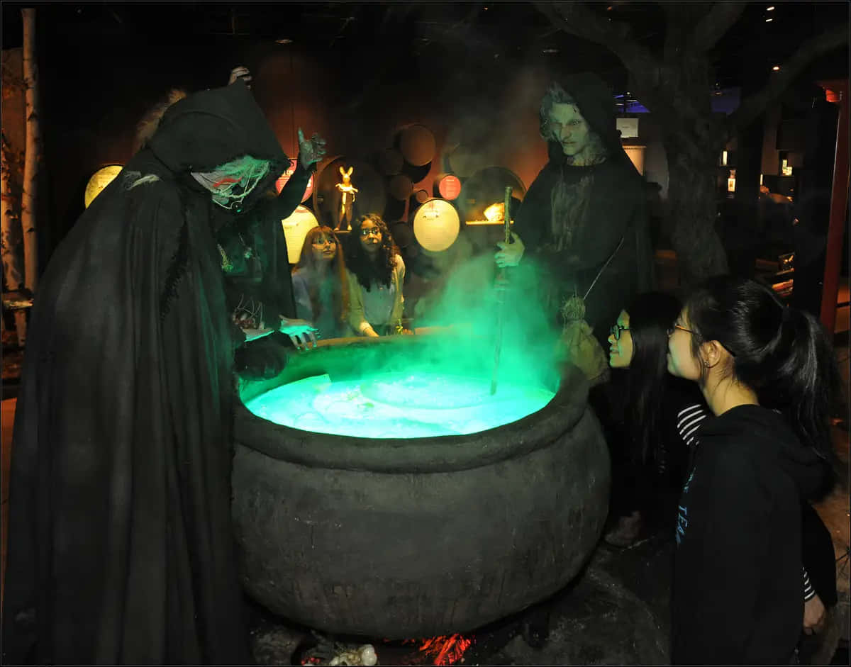 Mystical Cauldron in Dark Fantasy Setting Wallpaper