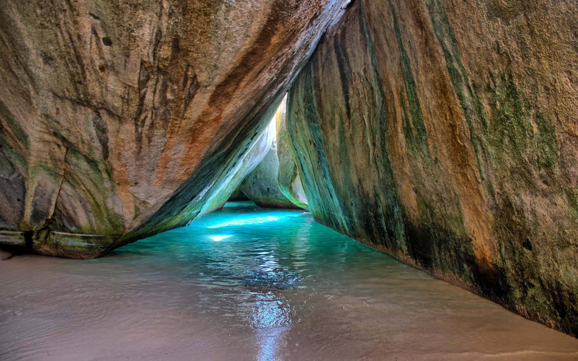 Majestic Cave Formation with Sunbeams Penetrating Through