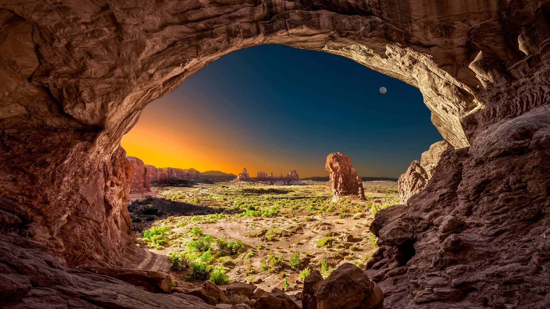 Cave Arch Framing Sunset Wallpaper