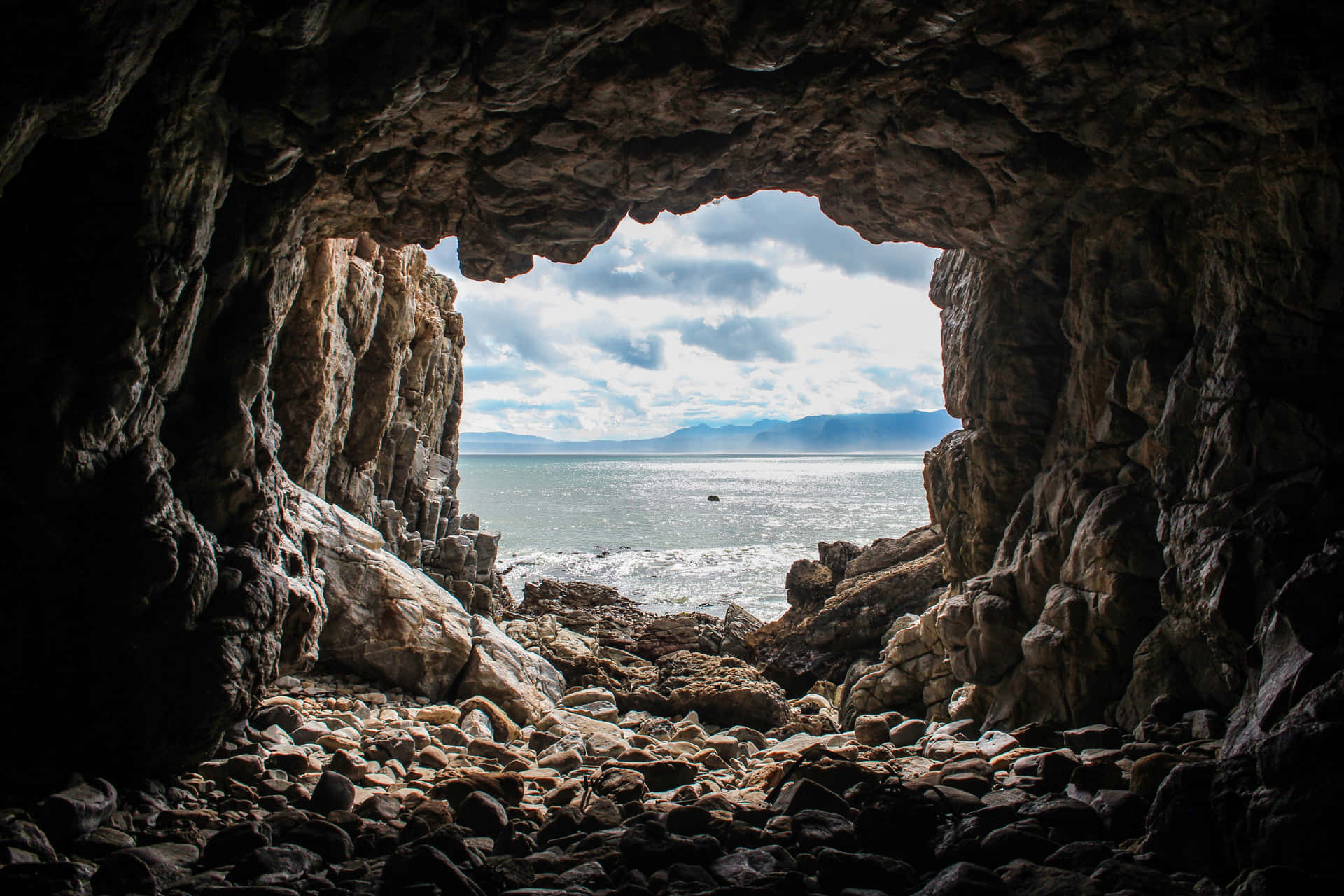 A Cave With A View Of The Ocean