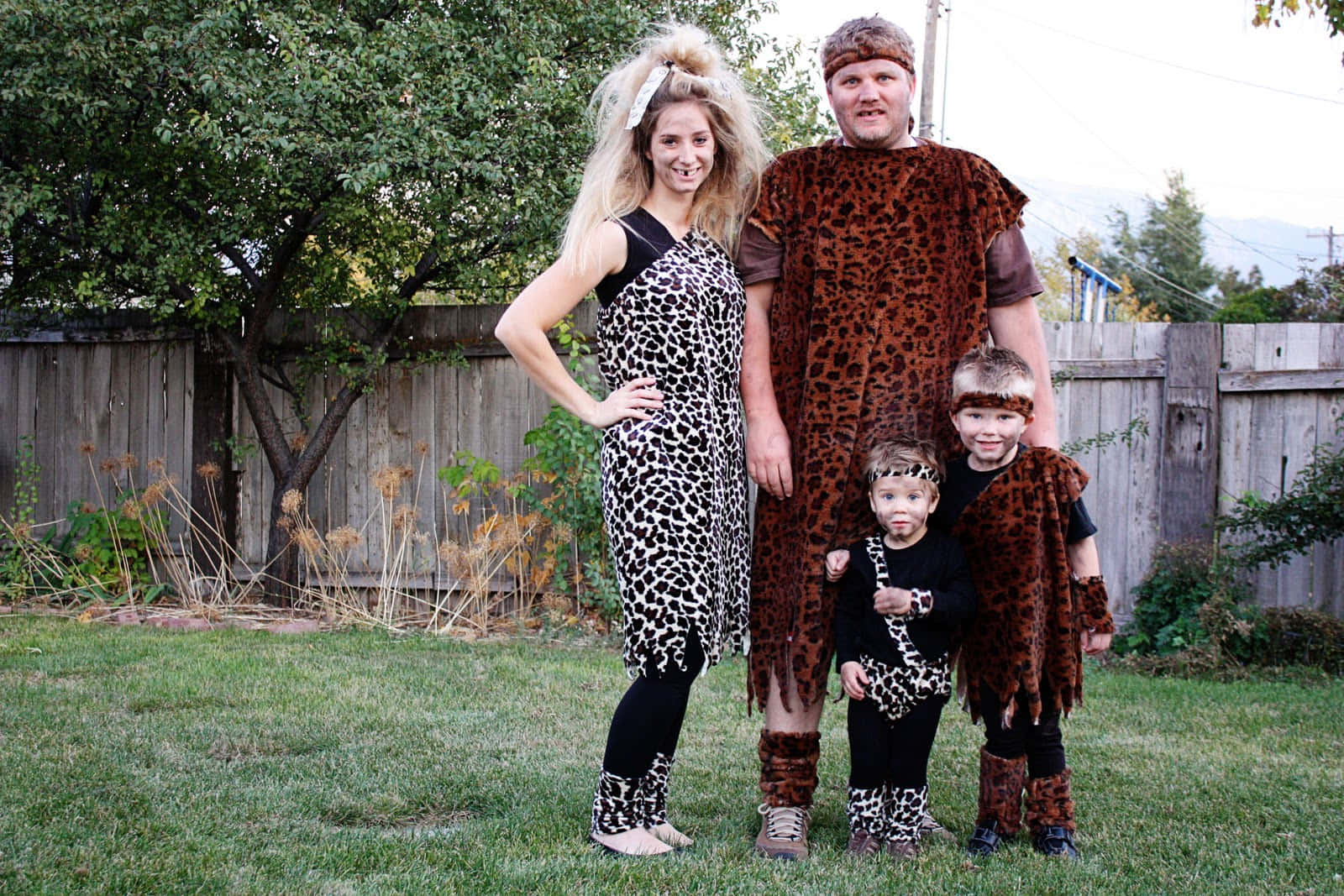A Family Dressed As Cavemen