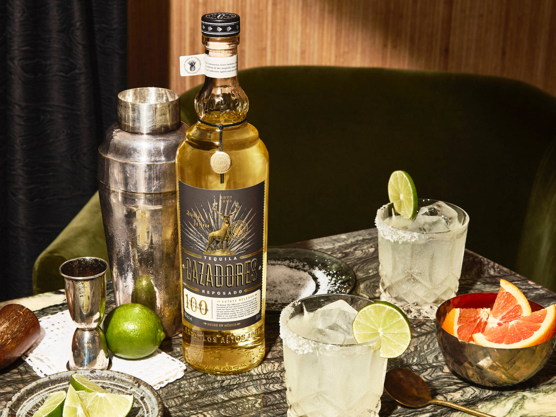 Cazadores Tequila With Orange And Lime Fruits Wallpaper