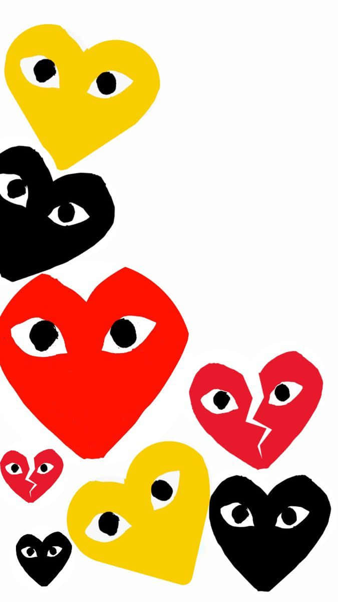 Download A Group Of Hearts With Faces On Them | Wallpapers.com