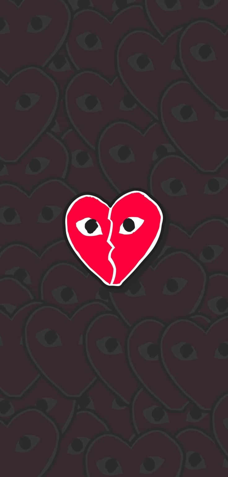 A Red Heart With Two Eyes On It Wallpaper