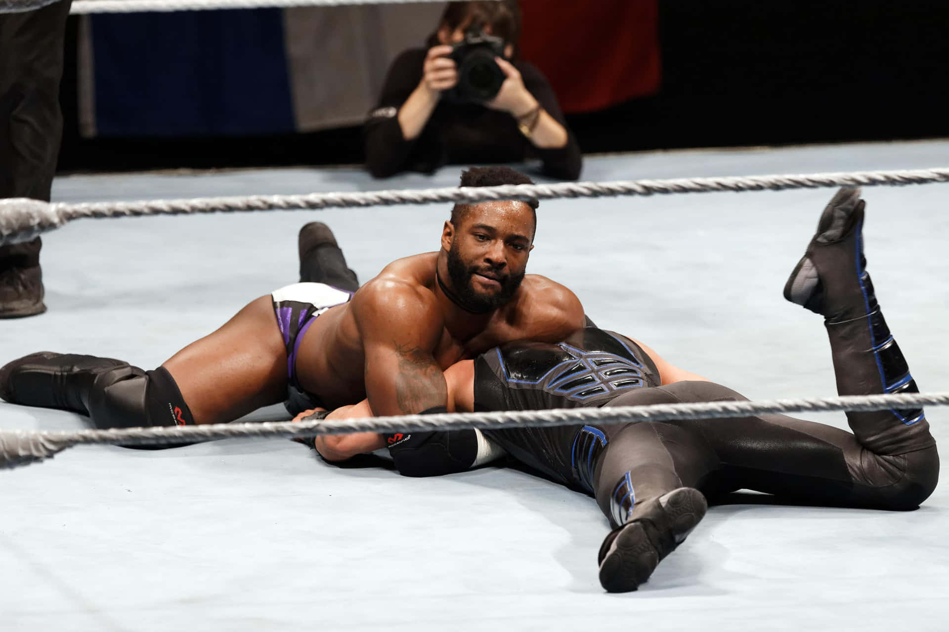 Cedric Alexander in a electrifying WWE match against Mustafa Ali. Wallpaper